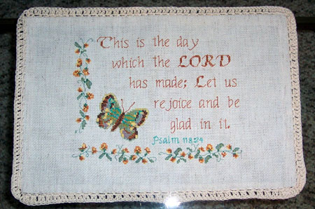 This is The Day stitched by Judy Kutchen
